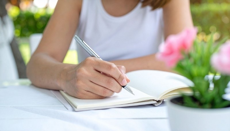 Journal and pen inviting reflection on your One Word challenge