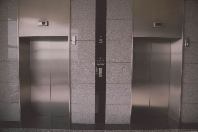 Apartment elevator representing a moment of hesitation and questioning beliefs